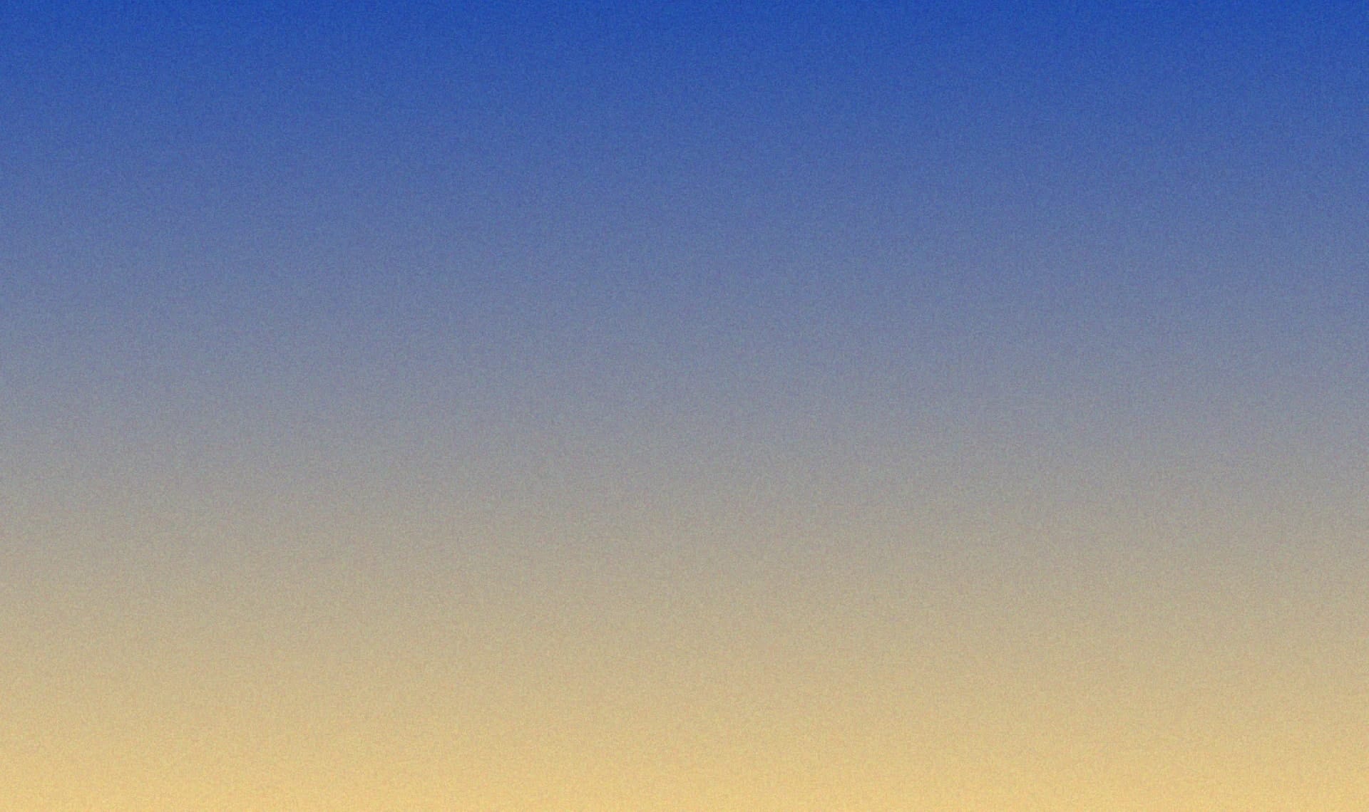 青から黄色への淡いグラデーション